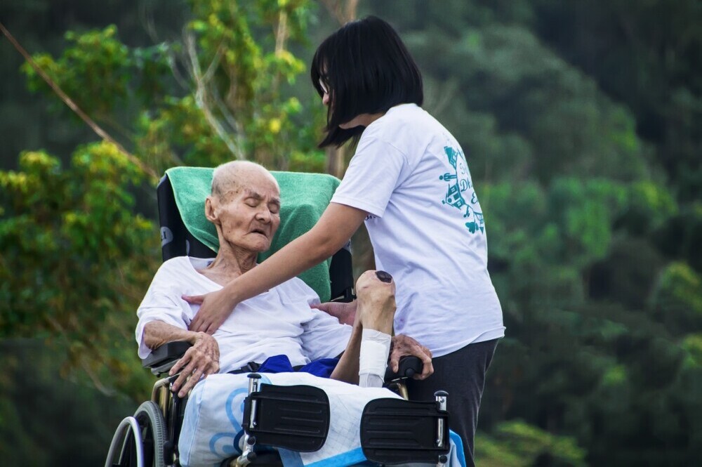 Home-Health-Care-Family-Caregivers-Where-to-Get-Help-Woman-with-Elderly-Man